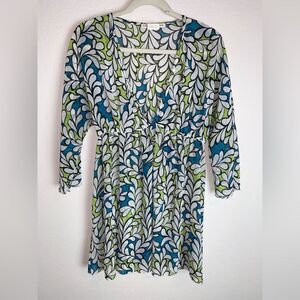 Daniel Benjamin: A deep V-neck sheer blouse in lovely shades of blue and green